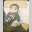 Baby being held by unidentified person (ddr-densho-483-594)