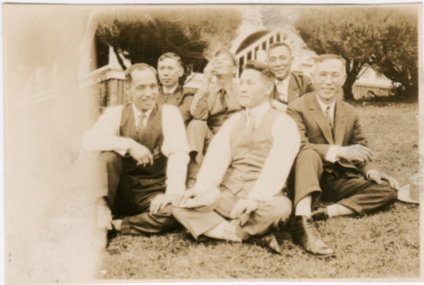 Six men sitting on the grass (ddr-densho-348-51)