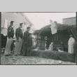 Four Sakura brothers look at nativity scene (ddr-densho-523-264)