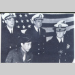 Four in front of flag (ddr-densho-1007-1337)
