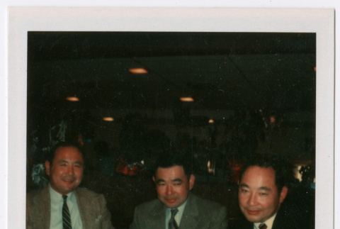 Three men at dinner (ddr-densho-501-12)