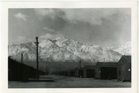 Camp street with Mt. Williamson in the background (ddr-manz-8-2)