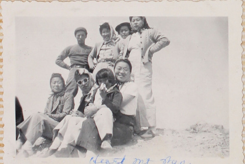 Seven adults and a child (ddr-densho-464-73)