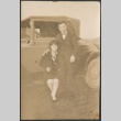 Couple with car (ddr-densho-523-19)