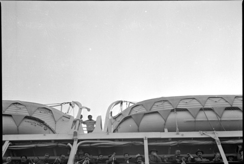 View of ship from dock, with streamers (ddr-densho-426-1675)