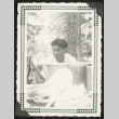 Hidemi at a campsite (ddr-densho-542-385)