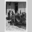 [Men in military uniform with military vehicle] (ddr-csujad-1-41)