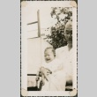 Man holding a baby (ddr-densho-321-1083)