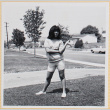 Girl standing on lawn (ddr-densho-522-113)
