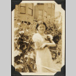Girl in white dress holding kitten (ddr-densho-423-535)
