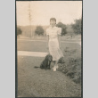 Woman with dog (ddr-densho-523-39)