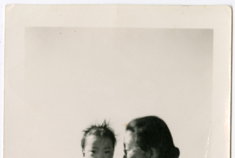 Sally Domoto holding a baby (ddr-densho-329-1332)