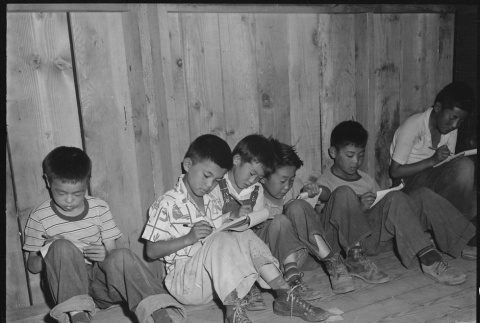 Japanese Americans in makeshift classroom (ddr-densho-151-368)