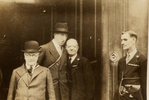 Men walking out of a building (ddr-njpa-1-2559)