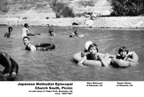 Group swimming in lake (ddr-ajah-6-235)