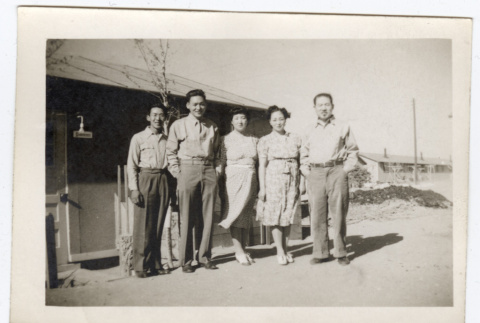 Family photo outside a barrack (ddr-densho-356-132)