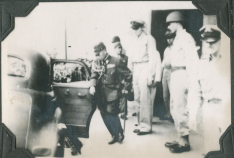 Men standing next to car (ddr-ajah-2-715)