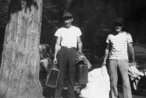 John Miyabe and Lloyd Wake holding luggage (ddr-densho-336-15)