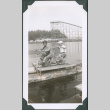 Photo of two children on a bike-powered raft (ddr-densho-483-1216)