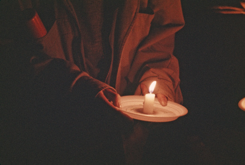 Camper holding a candle on the last night of camp (ddr-densho-336-1623)