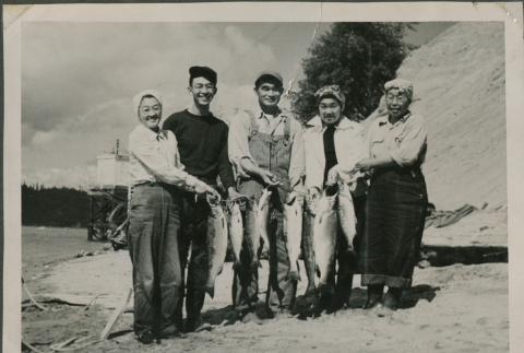 A group holding salmon (ddr-densho-201-994)