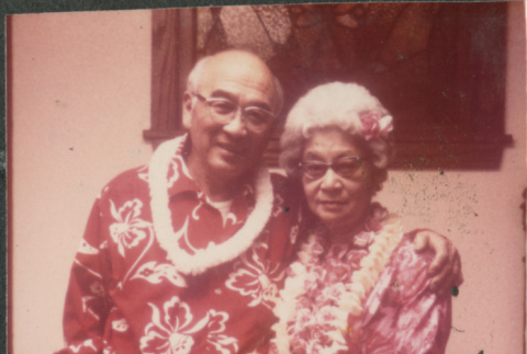 Chester and Agnes Sakura wearing leis (ddr-densho-523-650)