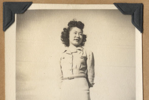 Woman standing on a path (ddr-densho-542-130)