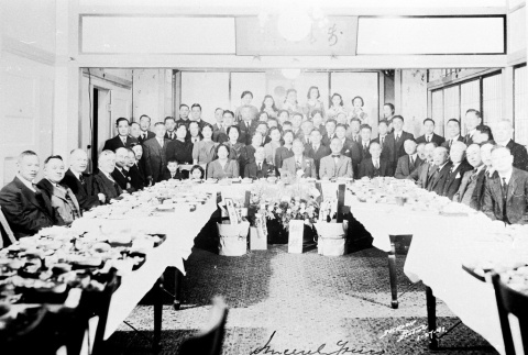 Group photograph in a Japantown restaurant (ddr-densho-39-26)