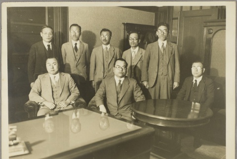 Men gathered for a group photo (ddr-njpa-13-1260)