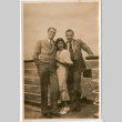 Tomoye Takahashi with two men, standing on deck of ship (ddr-densho-426-1401)