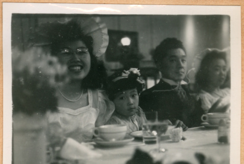 Martha Nozawa, Kashiwa Arizawa, Taro Katayama, and Helen Takahashi seated at head table (ddr-densho-410-551)
