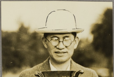 Junichi Fujii holding an award (ddr-njpa-5-994)