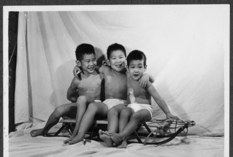 Tsukada brothers on sled (ddr-densho-443-89)