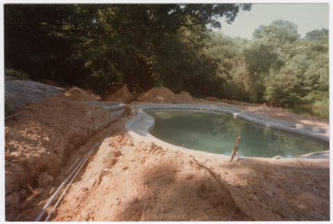Pool with landscaping under construction (ddr-densho-377-2462)