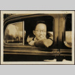 Man looking out window of car (ddr-densho-423-534)