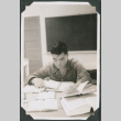 Man studying at desk (ddr-ajah-2-508)
