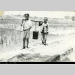 Okinawan boys carrying water (ddr-densho-179-142)