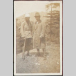 Two men posing during a hike (ddr-densho-278-52)