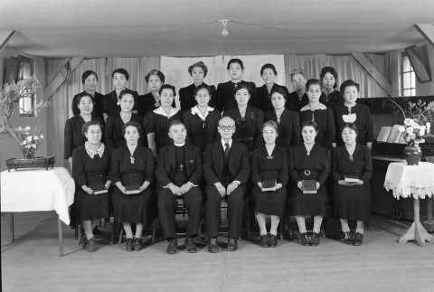 Group photograph inside a camp church (ddr-fom-1-81)