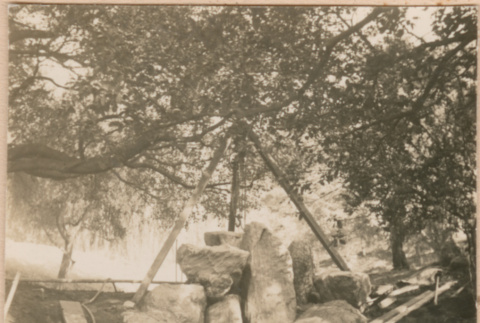 Boulders being placed for landscaping (ddr-densho-377-170)