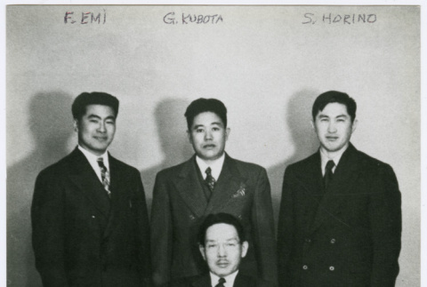 Portrait of 4 men in suits (ddr-densho-122-615)