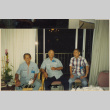 Three men sitting by balcony (ddr-densho-466-503)