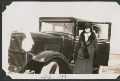 woman next to car (ddr-densho-378-555)