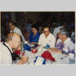 Group sitting at banquet table (ddr-densho-466-453)