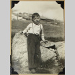 Child poses on rocks (ddr-densho-359-1689)