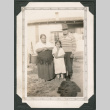 Photo of Mr. and Mrs. Edward August Duncan with daughter (ddr-densho-483-259)