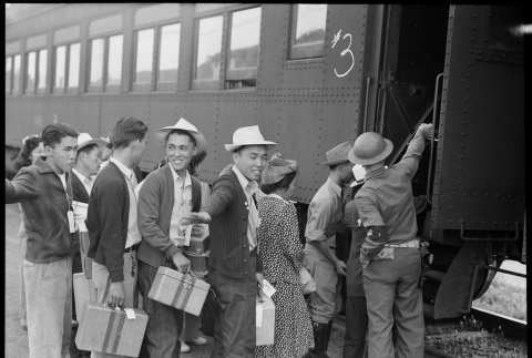 Young Japanese Americans boarding train (ddr-densho-151-294)