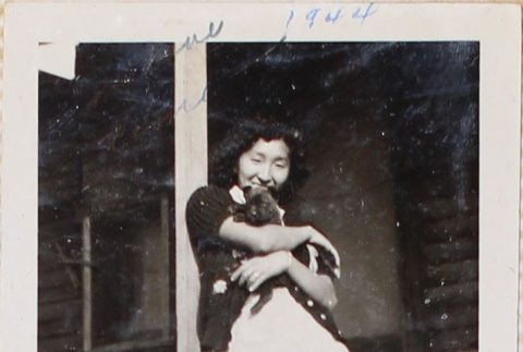 Woman holding cat (ddr-densho-464-61)