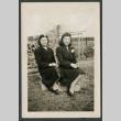 Two women pose on box (ddr-densho-359-171)