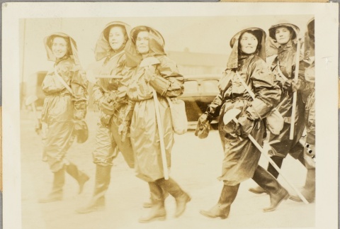 Female work crew carrying tools (ddr-njpa-13-231)